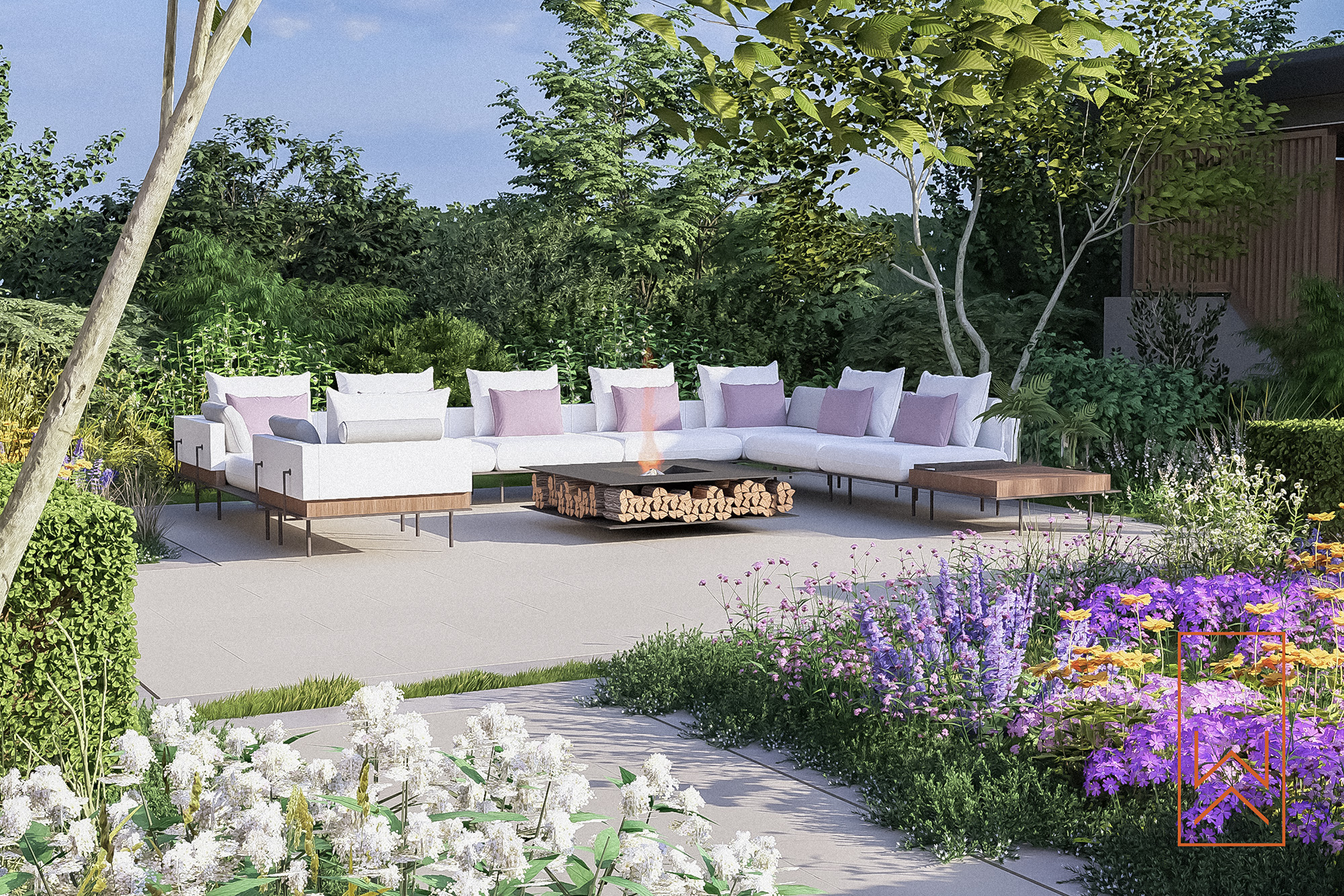 Large outdoor firepit seating area within naturalistic planting in riverside garden design, Welford-on-Avon.