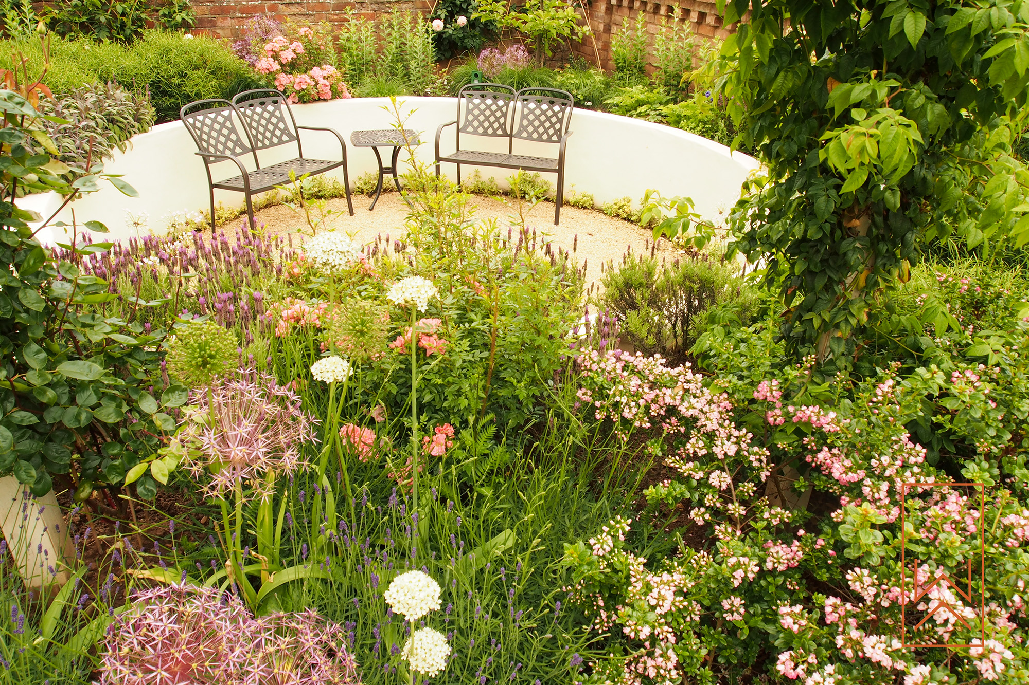 Curved sunken seating area in Mediterranean town garden, Leamington Spa