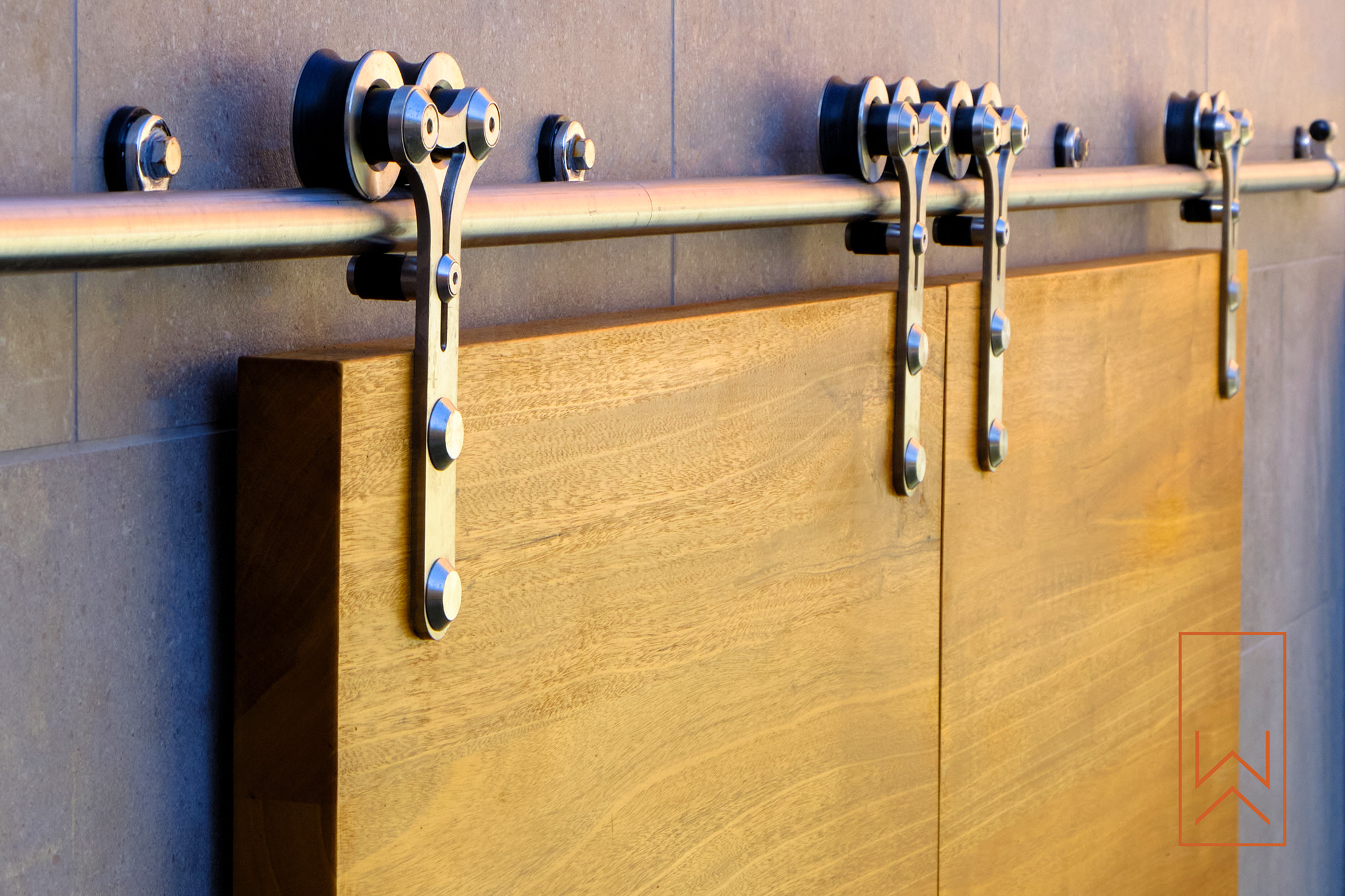 Sliding timber garden doors with stainless steel rail in modern Warwick town garden.