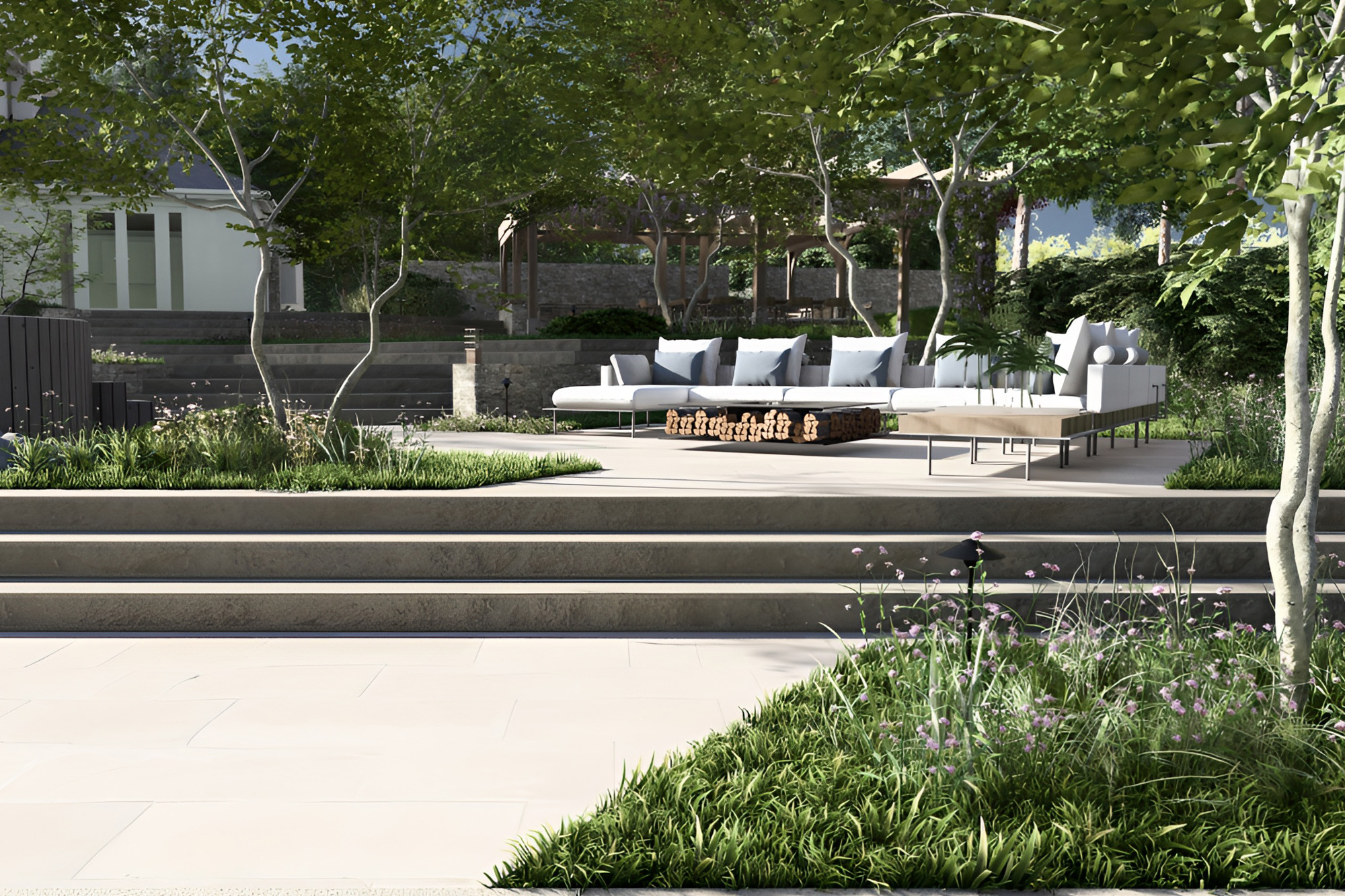 modern outdoor lounge seating area with garden planting design UK