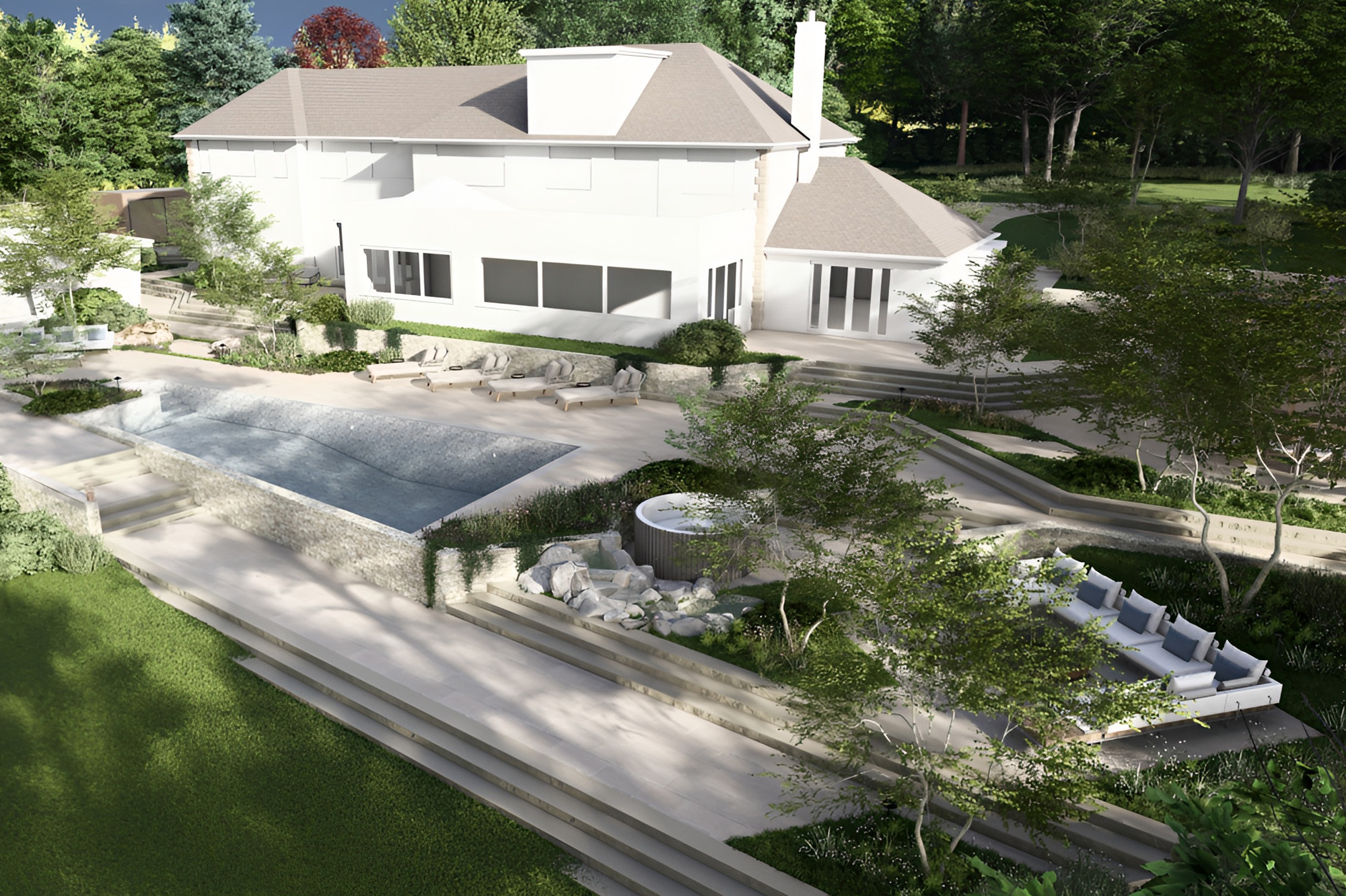 luxury garden design with swimming pool spa and stone terraces UK